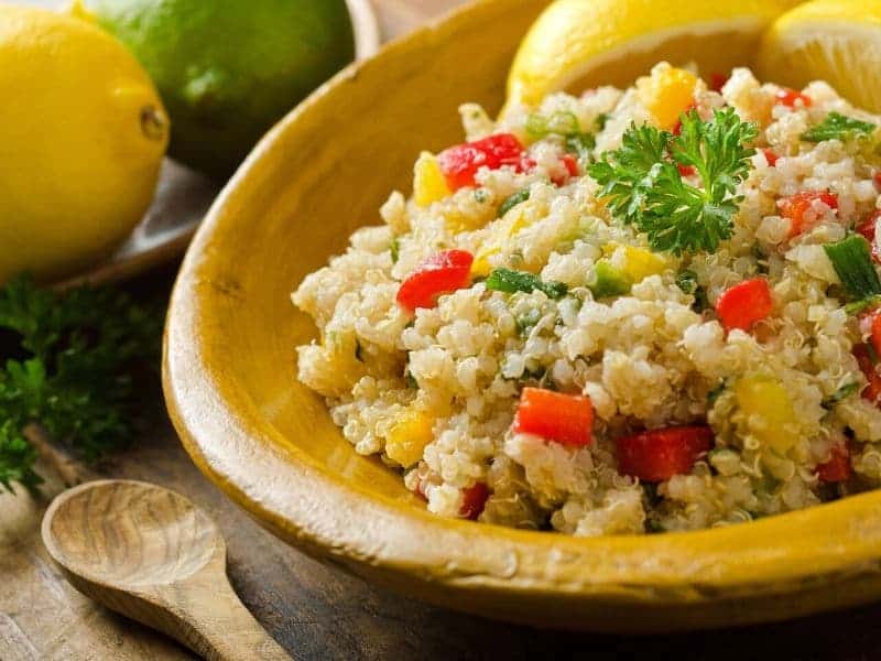 Bowl of cooked quinoa with vegetables 